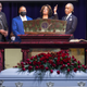Amir Locke’s mother Karen Well, speaks of her son alongside her husband Andre Locke, Sr., their attorney Ben Crump, left, and Rev. Al Sharpton, right, during Amir’s funeral at Shiloh Temple International Ministries, Thursday, Feb. 17, 2022, in Minneapolis, Minn. Locke was killed Feb. 2 by Minneapolis police as they executed a no-knock search warrant.